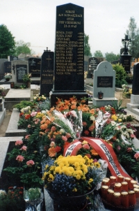 The grave of fourteen murdered citizens of Tušť in Gmünd, Austria (1993), in 1993 the Suchdol nad Lužnicí council refused to provide the murdered with space for a grave in the Suchdol cemetery 
