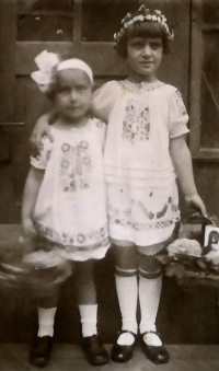 With her sister in childhood