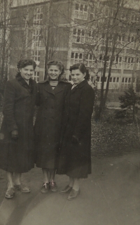 As a young woman at the Bata factory, the witness stands in the middle, next to her friend, Gottwaldov (Zlín), 1952