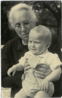 With his granny 