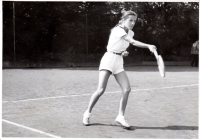 Playing tennis, june 1956