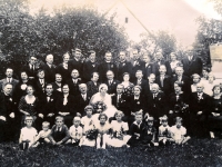 Family photo - in the back row first from the left adult Karel Lanczik, RAF pilot, in the bottom row second from the right Jarmila Štěrbová in her childhood