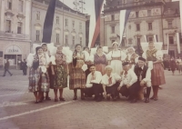 Ivo Poduška's mother (fourth from the left) in a Chod costume, surrounded by others; she was an active cotter