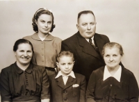 With his family as a child