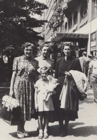 Anna Macková with her mum in Prague on their way to see father in prison, the 1950s