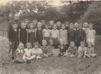 Margit standing fifth from left, photo from second class, Bernartice, 1947

