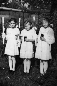 The witness (on the left) at Holy Communion in 1944