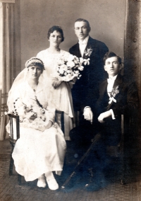 Wedding of parents, bride and groom sitting