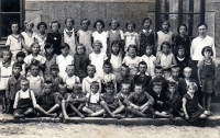 A photo from Nový Bydžov general school in 1934 - 1st row, the third one from the left
