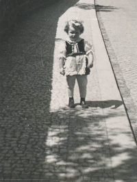 In her first folk costume, 1945