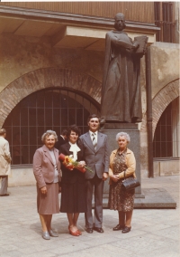 Jana Hrabětová with her mother Jana Plachá, husband, and his mother Anna Hrabětová, graduation ceremony, 1982