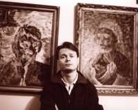 Igor Chaun with his paintings 