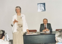 The witness is giving a lecture at the FOR ARCH festival in 1997