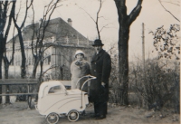 Lubomír's parents with baby Lubomír in a pram