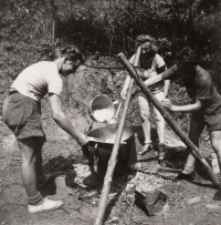 Cooking over an open fire. Summer camp in Hodruše. 1950
