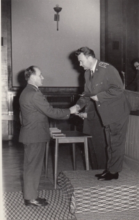 Graduation ceremony at the Klement Gottwald Military Political Academy, Josef Mervart receives a diploma from Rector Vojtěch Mencl, Prague, March 1969. 
