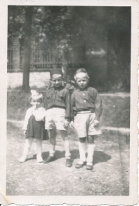 Participant of the XIth Sokol Meeting. From the right: Jaromír Pomahač, ??, sister Helena, Prague, 1948