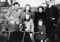 The Korbel family during the war years in England. Madeleine front right