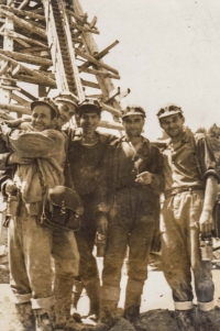 On the right, husband Venca Kopáček, with a group of other miners