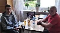 A pupil of the Czech School in Rezno filming an interview with a witness in Oskar Siebert's apartment in Rezno, May 2021