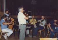 Josef Kobzík at the performance of the dulcimer ensemble Břeclavan, turn of the 1980s and 1990s