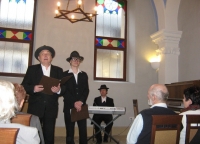 Jiří Mach (on the left) performs in a program about Jewish humor in 2012