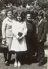 Witness (left) with daughter, mother and son