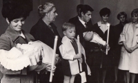 Igor Kyselka at the baptism at the age of four, on the left journalist Magdalena Dietlová (aunt of the witness)