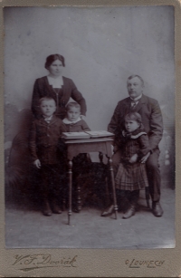 His grandfather Josef Krupka and grandmother Alžběta with family (his mother is sitting on the right with her father)