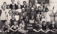 In the second grade, Jiří Šulitka sitting in the bottom row, third from the left, 1940-1941