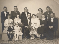Wedding photograph of Mr. and Mrs. Hrňa and their families. 1960