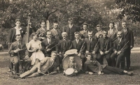 Her father František Brych with a flute, he is sitting in the first row from the right, U Stajskalů restaurant in Heřmanův Městec in 1922 