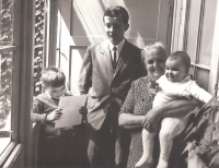 Václav Štěpánek (on the left) with school report from the first year, his cousin Jaroslav Krejzlík, grandmother from his father's side Anna Štěpánková and sister Anna are next to him, 1967