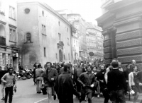 Protestors running away during riots in Brno in 1969