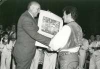 Receiving a prize - the Ministry of Culture's Certificate of Merit to commemorate the 20th anniversary of Martin Hrbáč's ensemble. Veselí nad Moravou, 1986 
