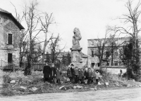On the left the parish of Hrabyně, on the right the torso of the castle and in the middle the destroyed statue of St. Anne, 1945