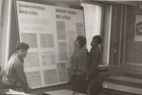 Student Milan Koutný in 1989, dismantling communist bulletin boards, from left Tomáš Vlach, Milan Koutný and Leoš Voltr