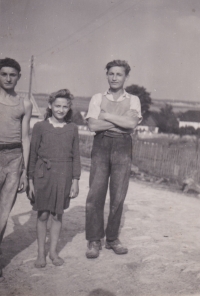 Barefoot Marie Janáková between her brothers  Václav and Bohoušem. Probably the first half of the 1940's