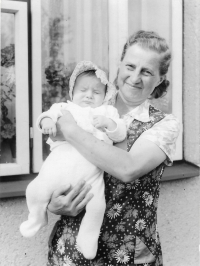 Mother-in-law of Oldřich's son, Mrs. Hladká, with her granddaughter, Veal, 1980s