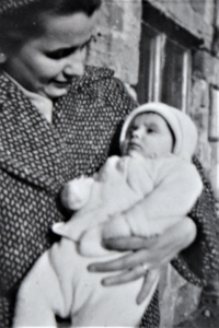 Jaroslav Smutný's wife Vlasta with the first-born son Jan. Handlová, Slovakia, 1957.
