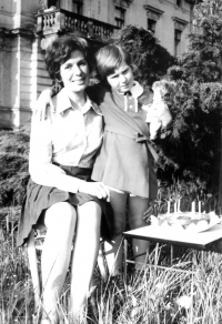 Celebrating her sixth birthday in Mašek's garden in Turnov with his mother 
