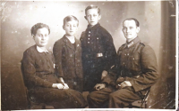 Photo of the grandparents and his father with his brother as young boys around 1938