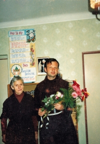 With his mother, 1991