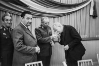 Do you fancy a cigarette, Comrade Husák? - Army General and Minister of Defence Martin Dzúr lighting a cigarette for the General Secretary of the Central Committee of the Communist Party of Czechoslovakia Gustáv Husák; photo by Bořivoj Černý, first half of the 1970s 