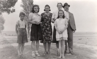 With parents, c. 1945