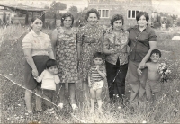 Our extended family - me and my mother, first from the left, 1976, in the back you can see the building of new houses in the former settlement