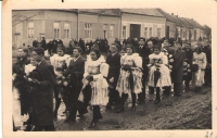 Marie Rychlíková attending her schoomlate´s funeral in 1943, first from the right in folk costume
