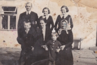 Family Sýkora, hamlet Křemen near Lipnice nad Sázavou, 1930s. Top row from the right: elder sisters of the witness, father František and bottom row from the left: brother, mother Marie, witness Veronika Veselská, grandmother