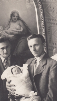 Dagmar's baptism, with her father on the right. 1951