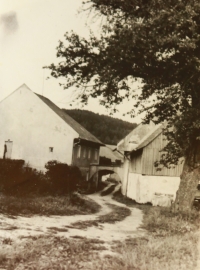 A view of the family farm before the stable was demolished